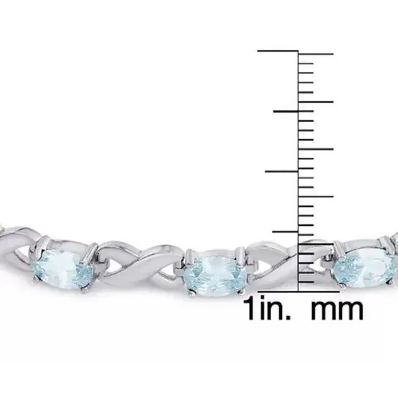 R H Macys co fine jewelry genuine blue topaz bracelet sterling silver New In Box